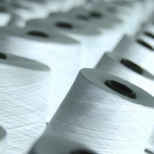 Functional yarn cones on the production line for bulk B2B orders