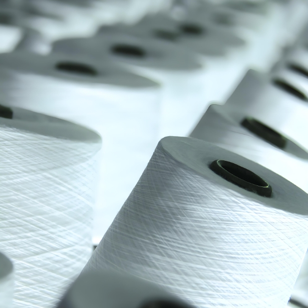 Functional yarn cones on the production line for bulk B2B orders