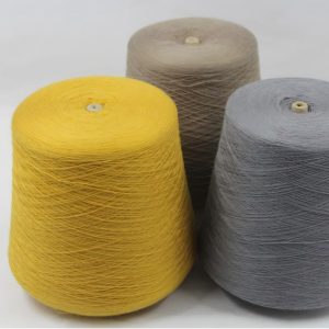 Thermal Sock Yarn for Winter Socks - 28S Single Ply Wool Acrylic Blend (1) Thermal sock yarn cones in yellow, gray, and taupe custom colors