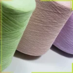 Close-up of 30s single ply dyed lyocell silk yarn cones