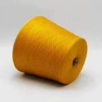 32/1 bamboo cotton blended yarn cone in golden yellow, 1-ply color-spun sock yarn