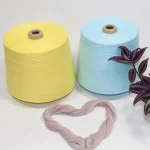 Yellow and light blue 32s bamboo cotton yarn cones with sample strand