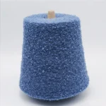 Dark blue soft loop wool blend yarn cone, front view, 8% wool 30% nylon 62% acrylic