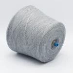 Light gray thermal wool nylon acrylic blended yarn cone side view for winter textiles