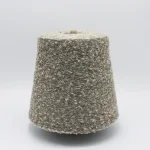 Melange grey viscose nylon boucle yarn cone with textured loop surface