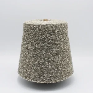 Melange Grey Viscose Nylon Boucle Yarn Melange grey viscose nylon boucle yarn cone with textured loop surface