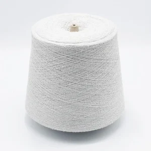White Viscose Nylon Boucle Yarn Cone White viscose nylon boucle yarn cone in 70/30 blend for soft, skin-friendly knitwear
