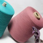 32s water repellent sock yarn cones in turquoise and pink, 65% polyester 35% cotton, single ply