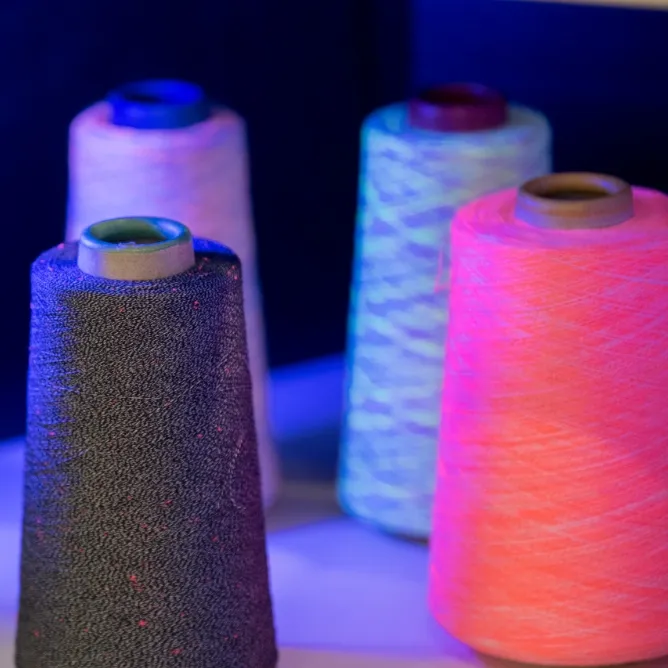 Colorful cones of antibacterial yarn prepared for authenticity and quality testing