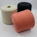 compact-spun 2/45 merino wool blend yarn cones in pink ivory and black multi-angle display