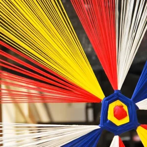 Textile yarns in production showing the practical context behind conventional yarn twist data