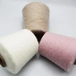 Multi-angle heat generating brushed yarn cones in white beige and pink
