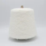 White heat generating brushed yarn cone for socks and knitwear with soft fluffy texture
