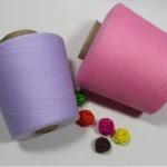 Pink and lavender temperature regulating yarn cones in pastel colors