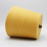 Cone sợi ramie cotton 32s màu vàng nhạt đặt ngang