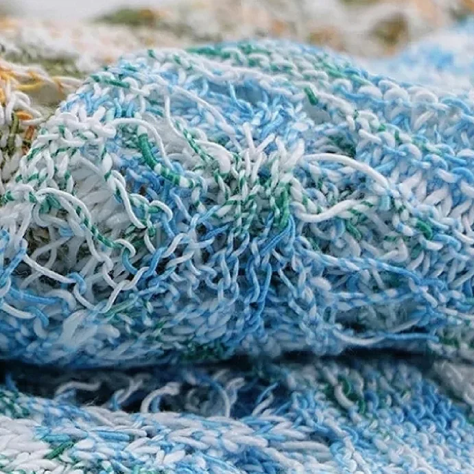 Knitted fabric sample showing the surface effect of color dot yarn