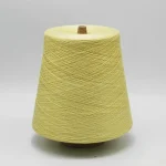 Pale yellow silk linen blend dyed yarn cone for spring summer knitting