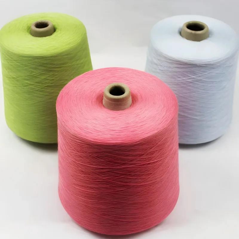 Cooling antibacterial sock yarn in pink, green, and white cone yarn colors