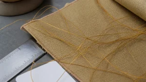Polyimide fiber strands on technical fabric sample for textile testing
