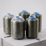 Bulk cones of PVD copper coated yarn with protective packing