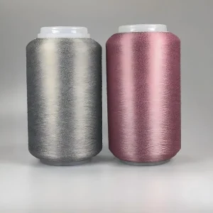 Silver and Pink Conductive Yarn Cones Silver and pink conductive yarn cones