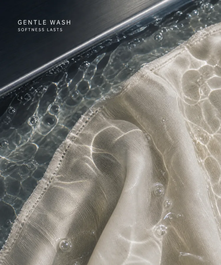 Lyocell fabric being gently washed in clear water